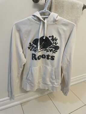 Roots Cream Hoodie with Dark Green Patch Logo
